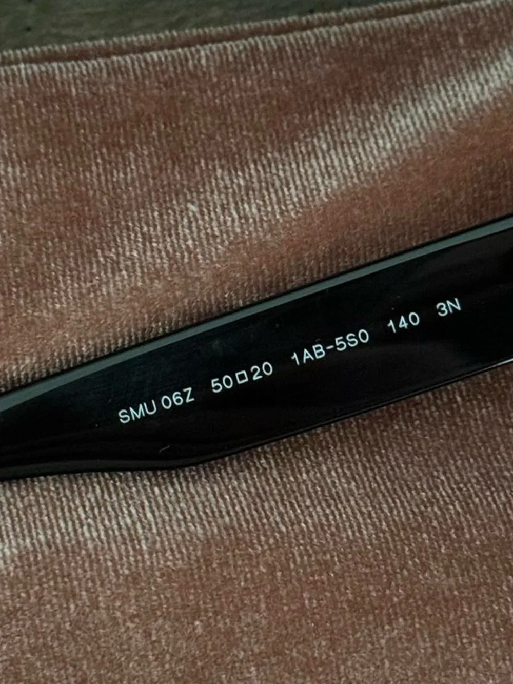 Miu Miu Black Oval Sunglasses